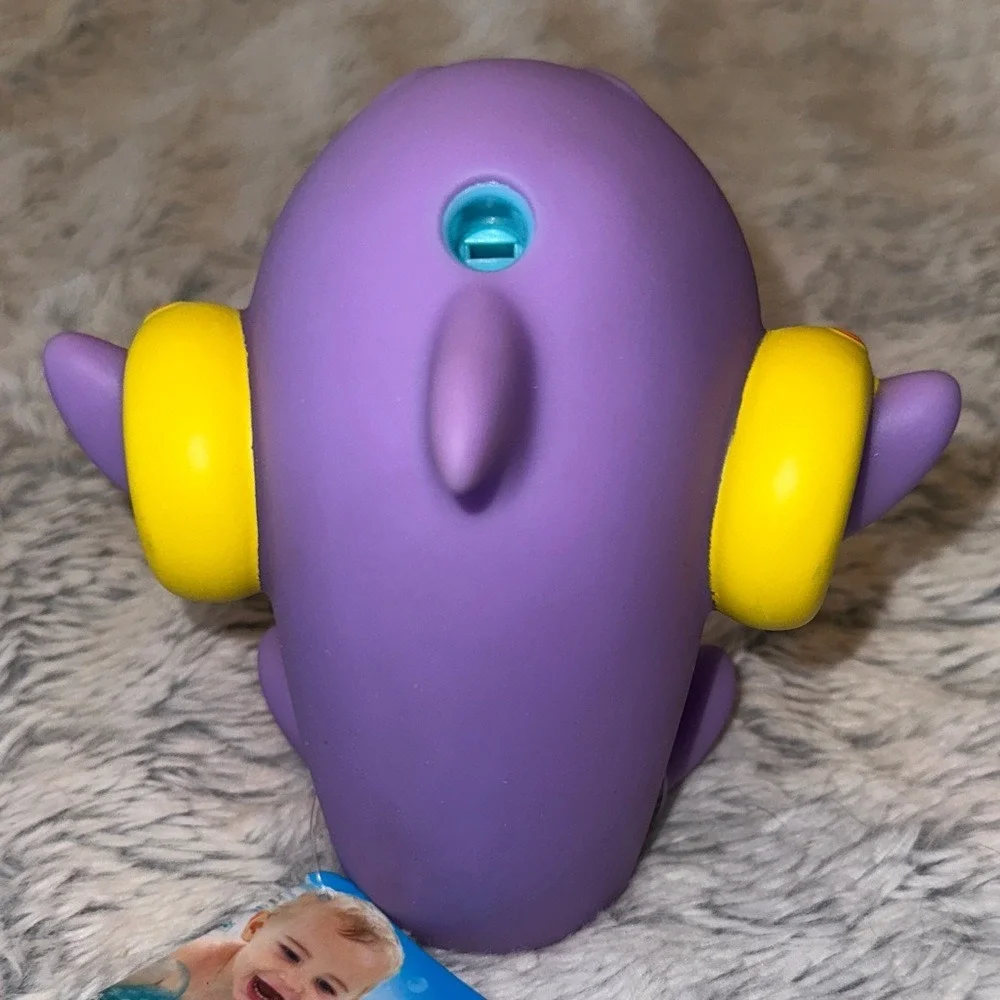 TOMY Water Whistlers Purple Dolphin Bath Toy E72379 Squirter Whistle 9m+